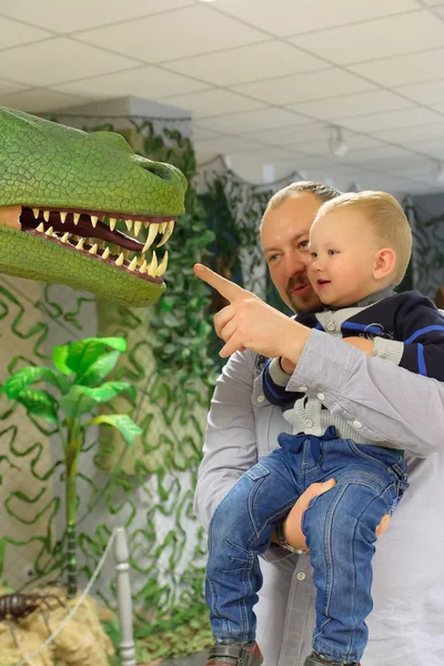 Dinosaur and boy — Stock Photo, Image