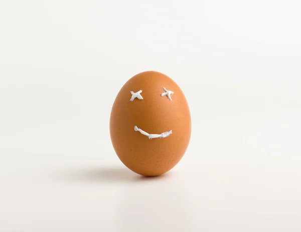 Smiling egg and toothpaste — Stock Photo, Image