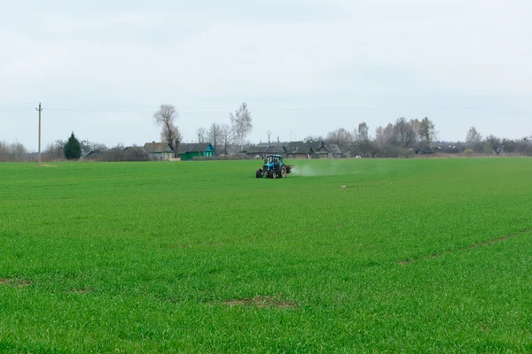 Tractor on field — Stock Photo, Image