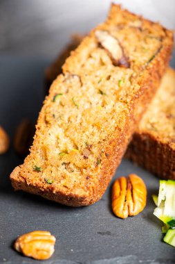 Home-made fresh baked zucchini quick bread with pecans.