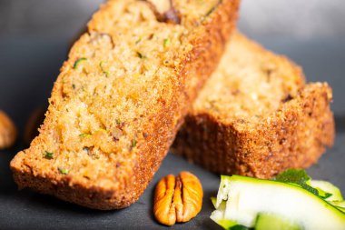 Home-made fresh baked zucchini quick bread with pecans.