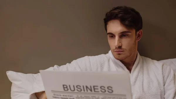 Focused Man Reading Business Newspaper While Resting Hotel Room — Stock Photo, Image