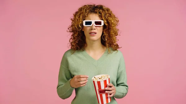 Worried Woman Glasses Holding Popcorn Bucket While Watching Movie Isolated — Stock Photo, Image