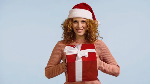 Pleased Woman Santa Hat Holding Red Gift Box White Ribbon — Stock Photo, Image