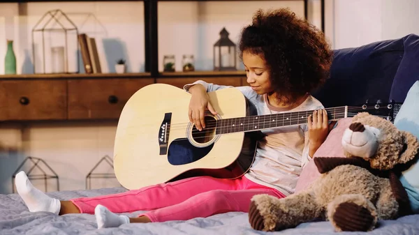 African American Child Playing Acoustic Guitar Bedroom — Stock Photo, Image