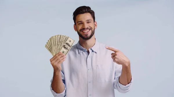 Cheerful Man Shirt Looking Camera While Pointing Dollars Isolated Blue — Stock Fotó