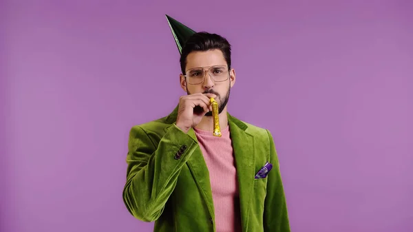 Man Green Jacket Blowing Party Horn Isolated Purple — Stock Fotó