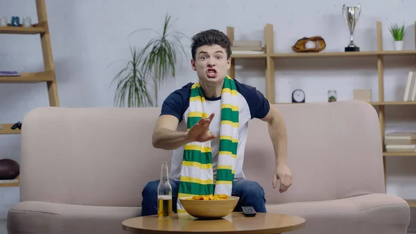 Excited Sport Fan Gesturing While Watching Match Home Beer Chips — Stockfoto