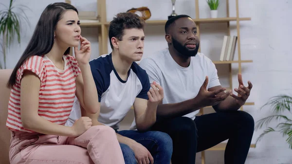 Multicultural Sport Fans Gesturing While Watching Competition Home — Stock Photo, Image