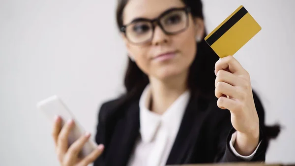 Businesswoman Doing Online Shopping While Holding Smartphone Credit Card Isolated — Foto de Stock