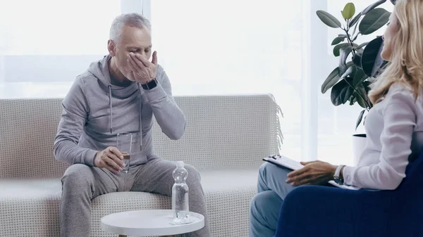 Middle Aged Man Sportswear Taking Pill Blonde Psychotherapist — Fotografia de Stock