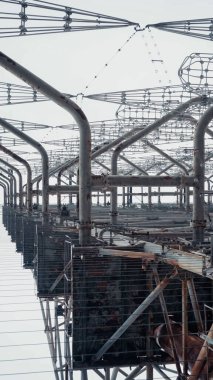 bottom view of metal radar tower in chernobyl exclusion zone