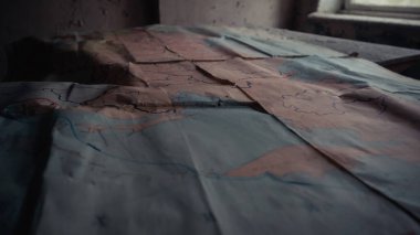 old maps in abandoned school in chernobyl exclusion zone clipart