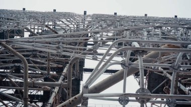 bottom view of metal construction of chernobyl telecommunication station in abandoned area