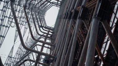 bottom view of radio station steel tower in chernobyl zone