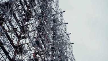 low angle view of chernobyl telecommunication station against grey sky