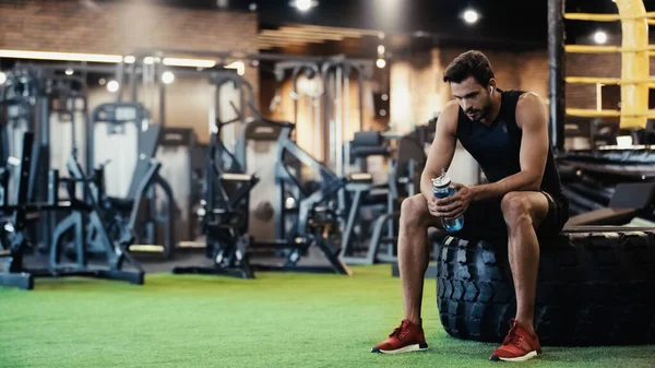 Exhausted Sportsman Earphone Listening Music Sitting Car Tire Holding Sports — Stock fotografie