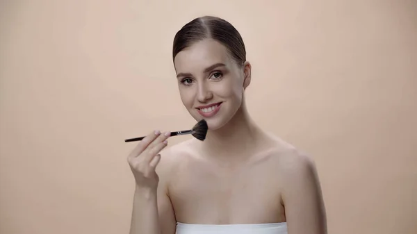 Happy Young Woman Bare Shoulders Applying Face Powder While Holding — Foto de Stock