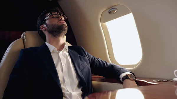 Businessman Formal Wear Sleeping Private Jet — стоковое фото