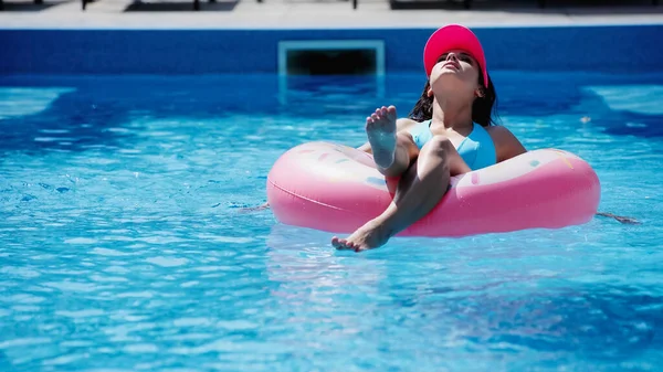 Young Woman Swim Ring Swimming Pool Blue Water — Stockfoto