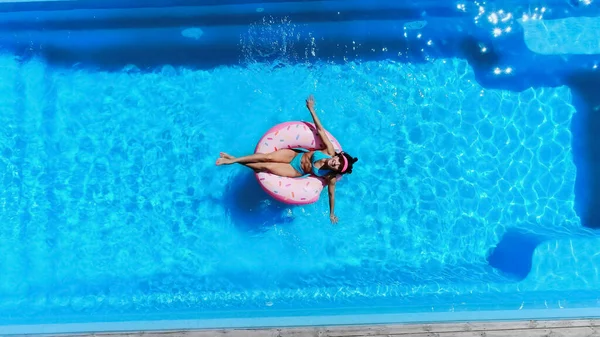 Top View Happy Woman Swimming Inflatable Donut Pool — ストック写真