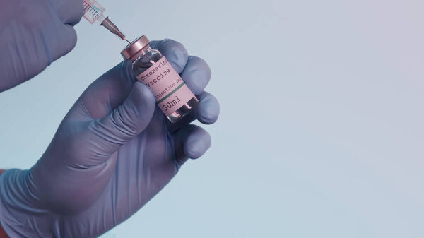 cropped view of scientist in latex gloves filling syringe with vaccine from bottle with coronavirus lettering isolated on grey 