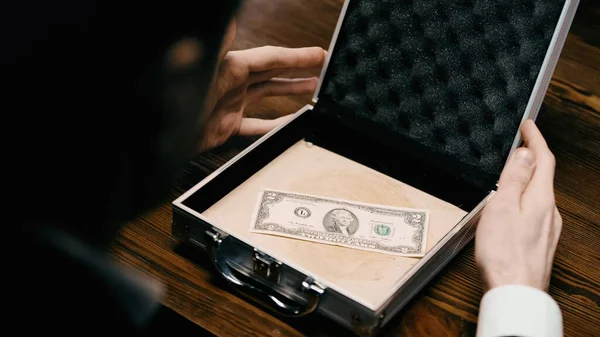 Blurred Businessman Holding Case Unique Dollar Banknote Table — Φωτογραφία Αρχείου