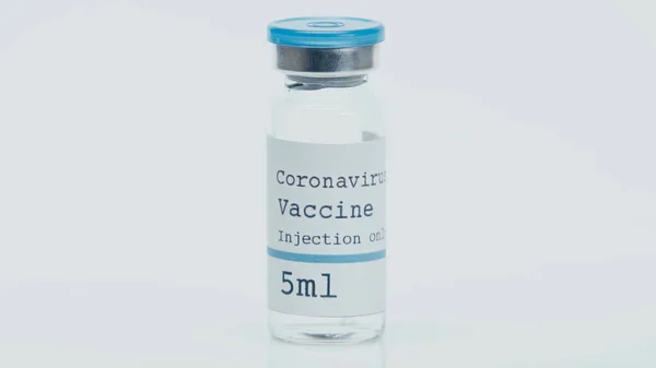 Bottle with coronavirus vaccine, only injection lettering isolated on white — Stock Photo