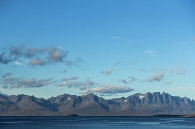 Norwegian alps on a sunny summer day. Mountains and blue sky.
