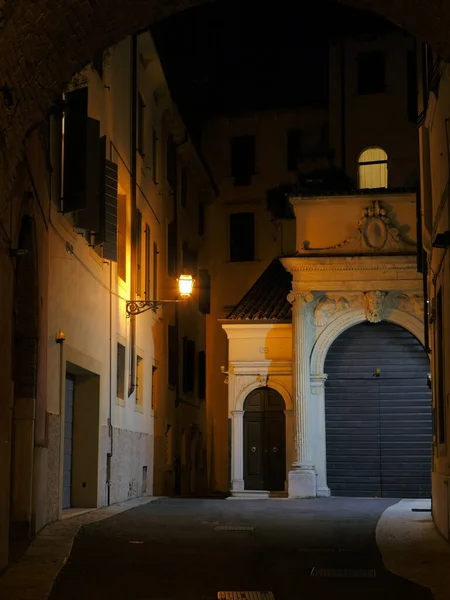Hidden corner of the streets of Verona.Dead end with a small courtyard illuminated by a lamppost.Mysterious and picturesque atmosphere.European style.
