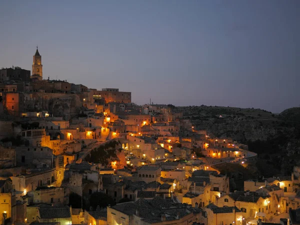 Evening view of the italian city of Matera. Colorful city with warm lights