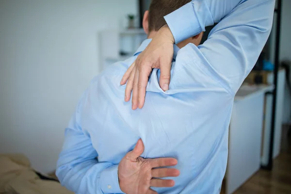 Feeling Tired Back View Frustrated Young Man Looking Exhausted Massaging — стоковое фото