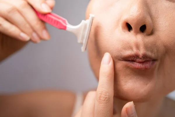 Funny Asian Woman Shaving Her Face Razor White Background Pretty — Stockfoto