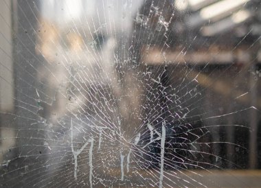 Broken glass window. Close-Up Of Shattered Windshield