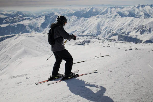 Skiing, skier, winter sport - woman skiing downhill