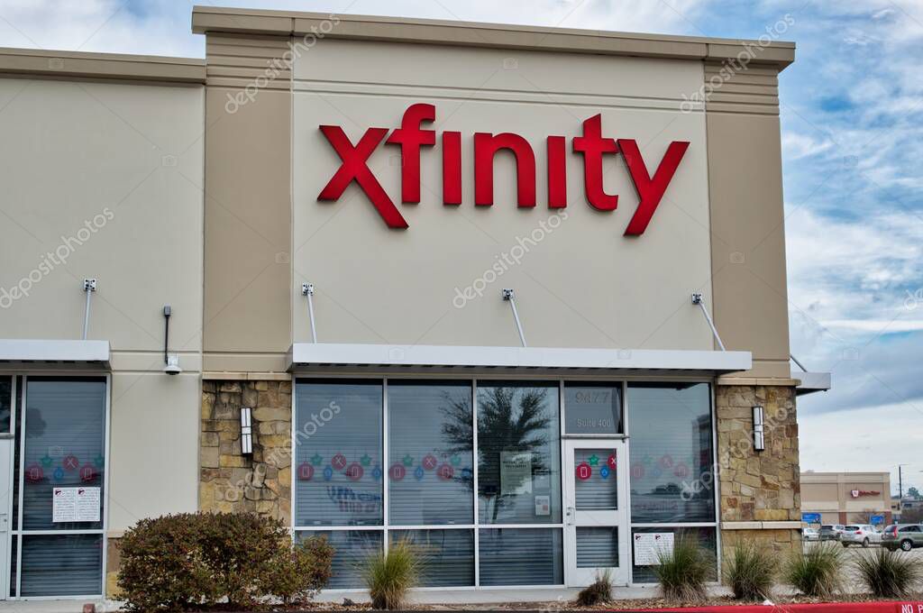 Houston, Texas USA 12-03-2021: Comcast Xfinity business exterior in Houston, TX. Telecommunications business established in 1981.