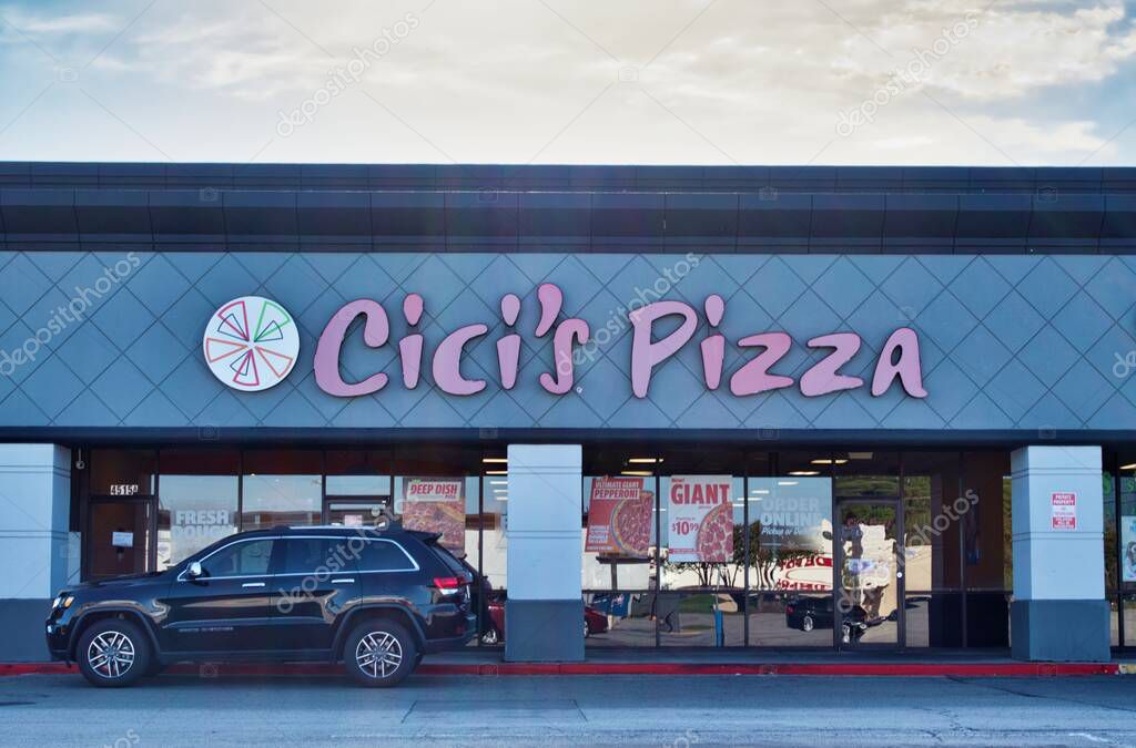 Houston, Texas USA 12-24-2021: Cicis Pizza restaurant storefront in Houston, TX. Family-friendly retail chain established in 1985 in Plano, Texas.