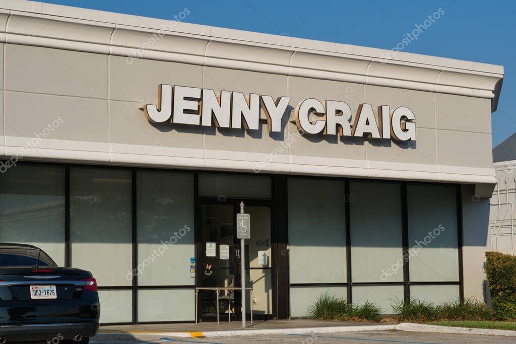 Houston, Texas USA 09-23-2022: Jenny Craig weight loss clinic building exterior and parking lot in a Houston, TX shopping center.