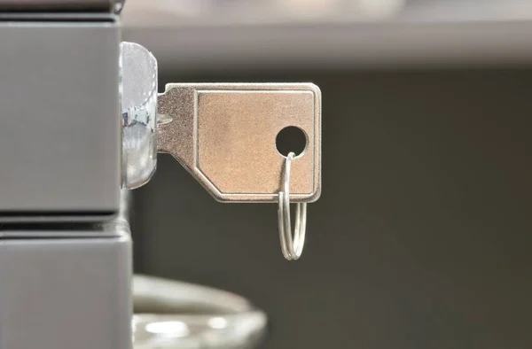 Generic Key Inserted Filing Cabinet Lock Side View Closeup Copy — Stock Photo, Image