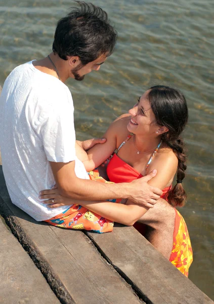 Portrait of a sweet couple looking at each other enjoying their — Stock Photo, Image