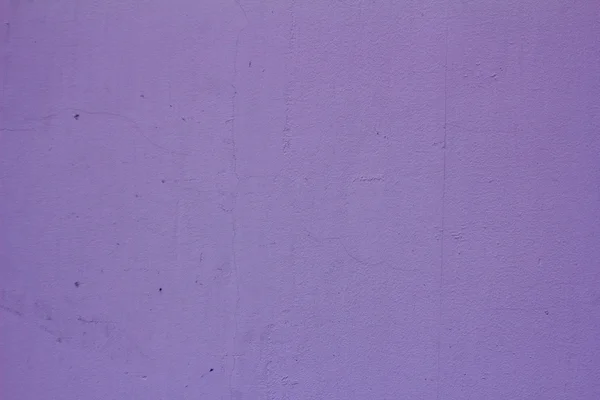 Текстурированная фиолетовая стена — стоковое фото