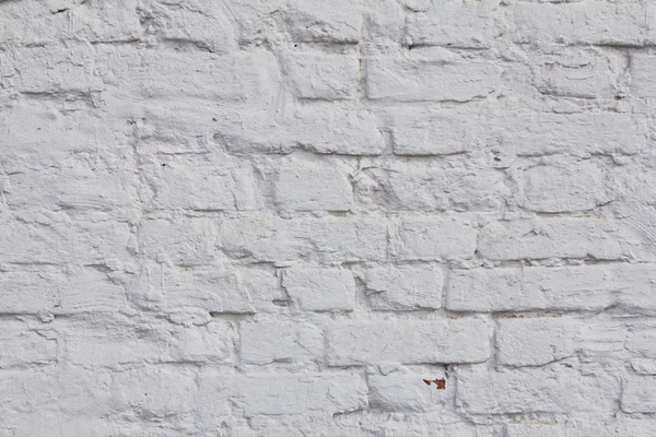 Старая гранж стена с трещинами — стоковое фото