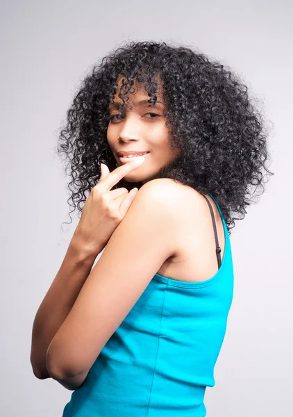Mulatto girl with dark curly hair — Stock Photo, Image