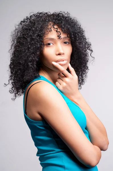 Mulatto woman thinking — Stock Photo, Image