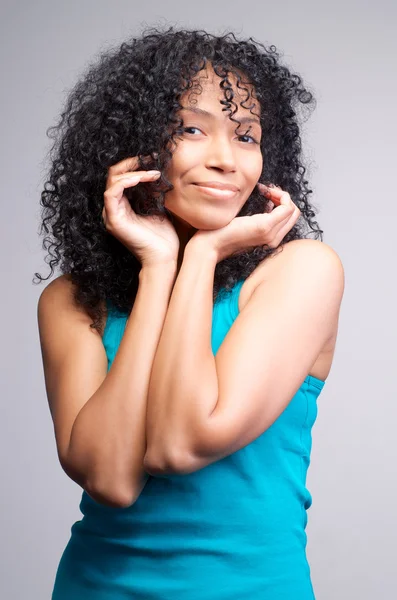 Mulatto girl with dark curly hair — Stock Photo, Image