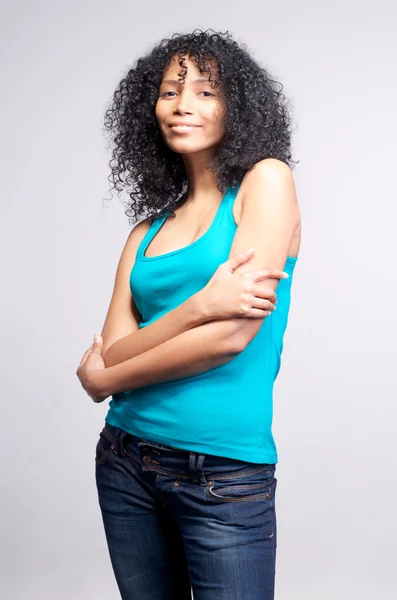 Mulatto girl with dark curly hair — Stock Photo, Image