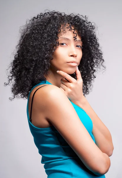 Mulatto woman thinking — Stock Photo, Image