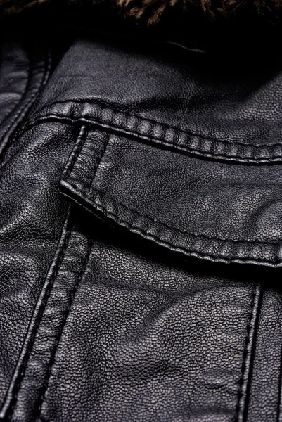 Detalles chaqueta de cuero negro —  Fotos de Stock