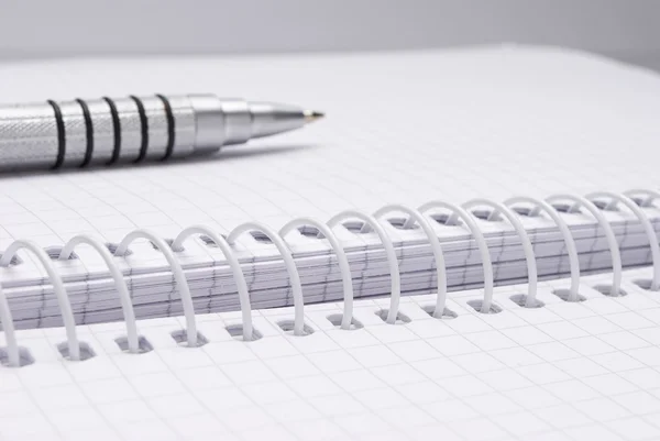 Pen on notebook — Stock Photo, Image