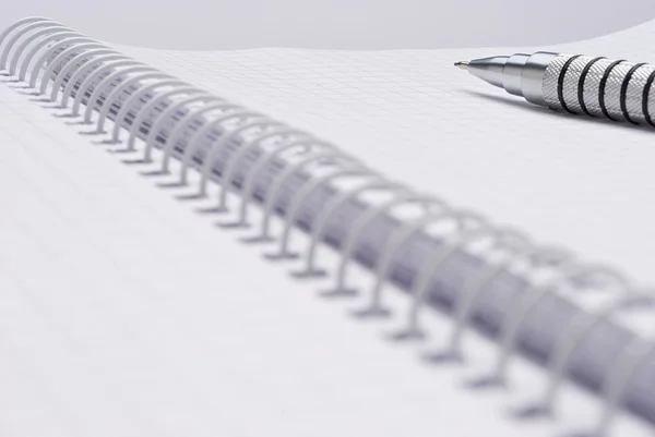 Pen on notebook — Stock Photo, Image